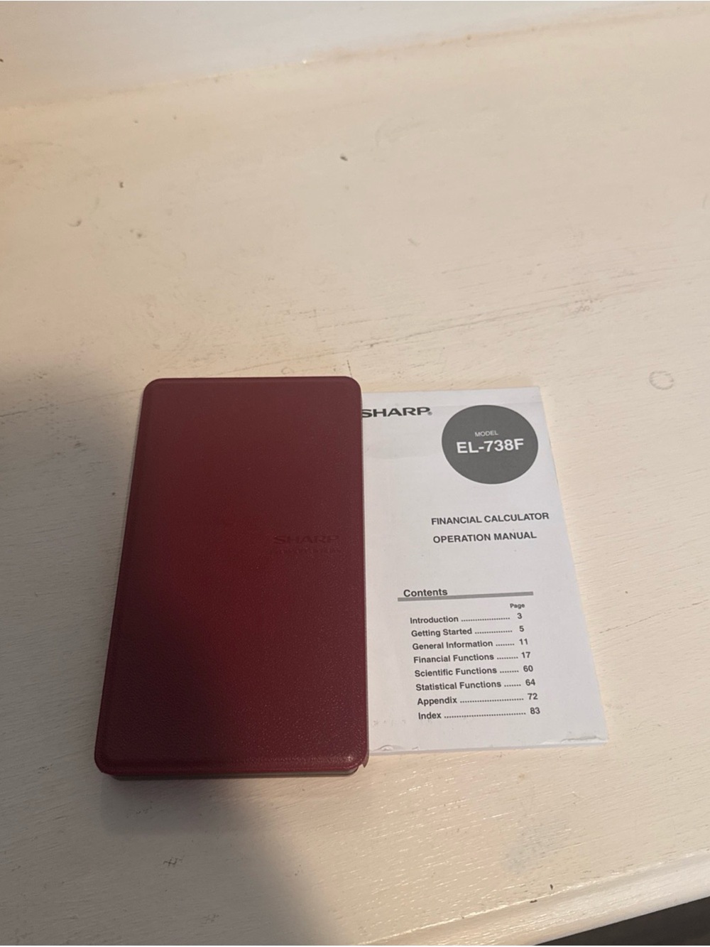 Red Sharp EL-738F Financial Calculator with Cover and instructions